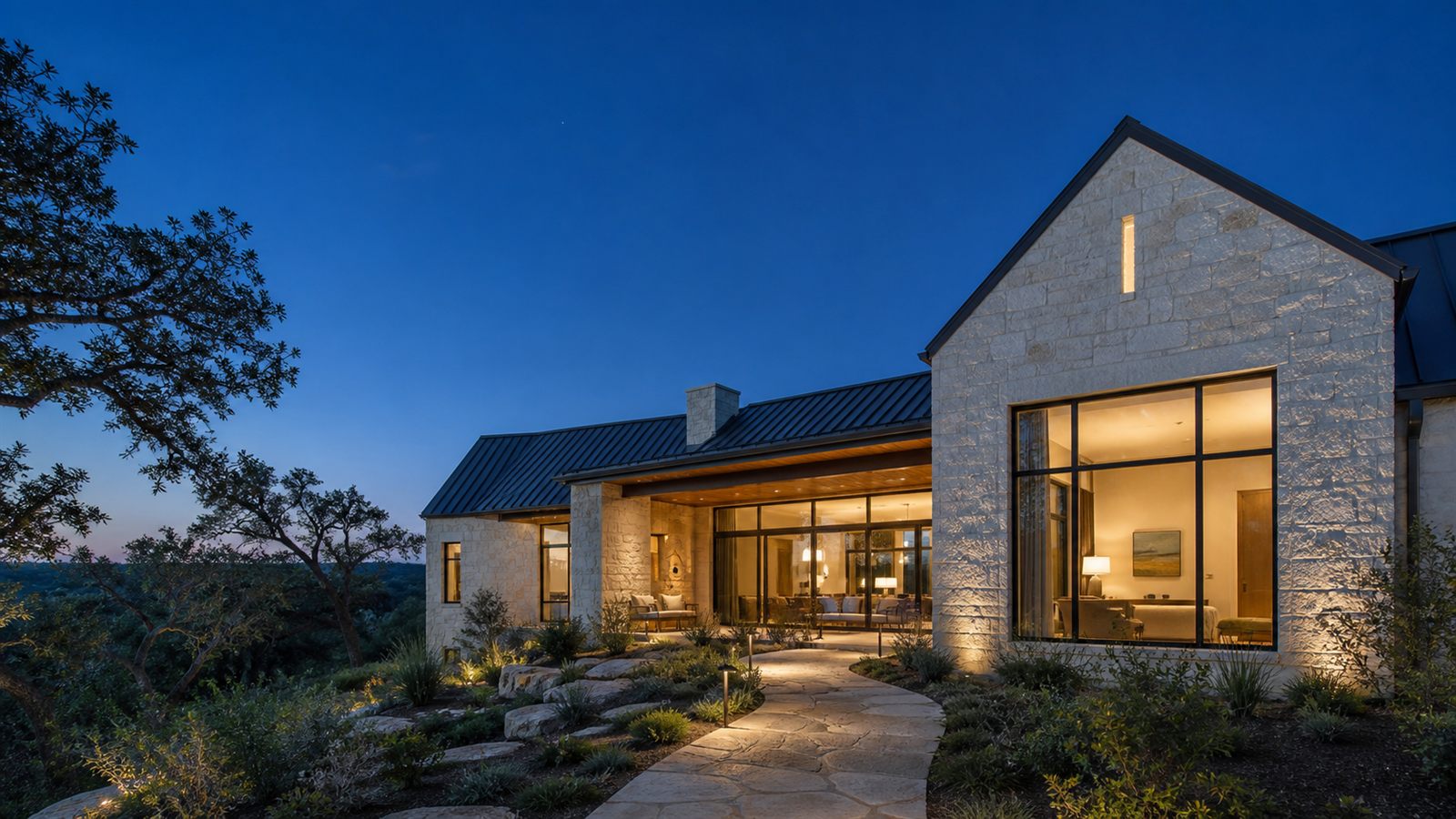 Texas Hill Country custom home exterior at dusk
