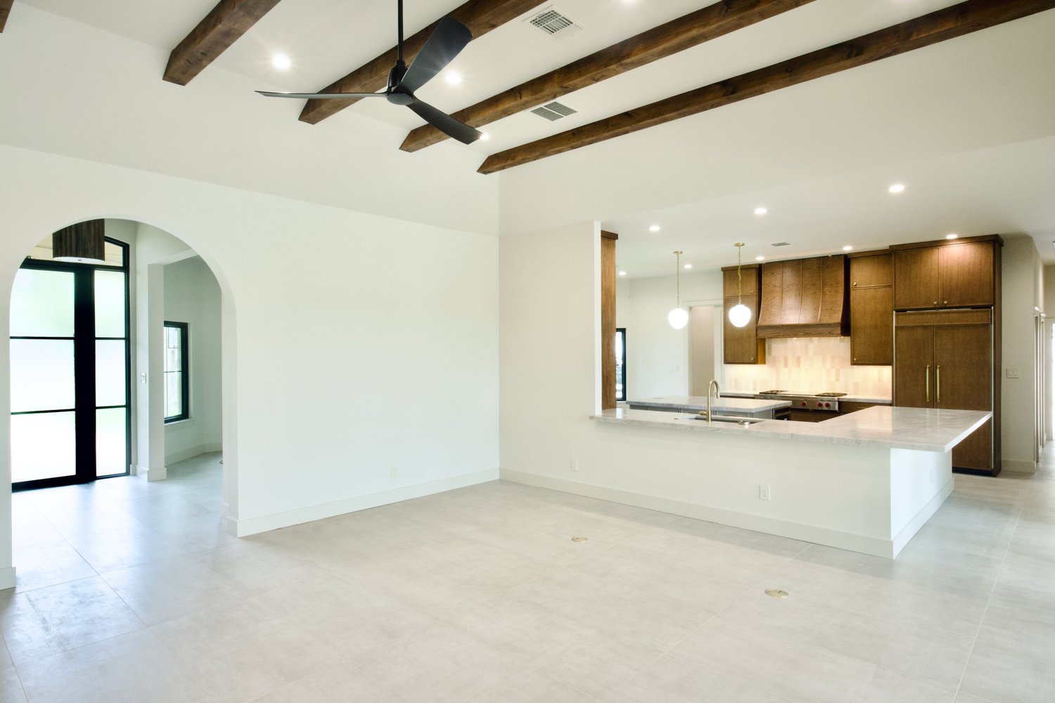 The rebuilt living room in the San Marcos whole-home renovation