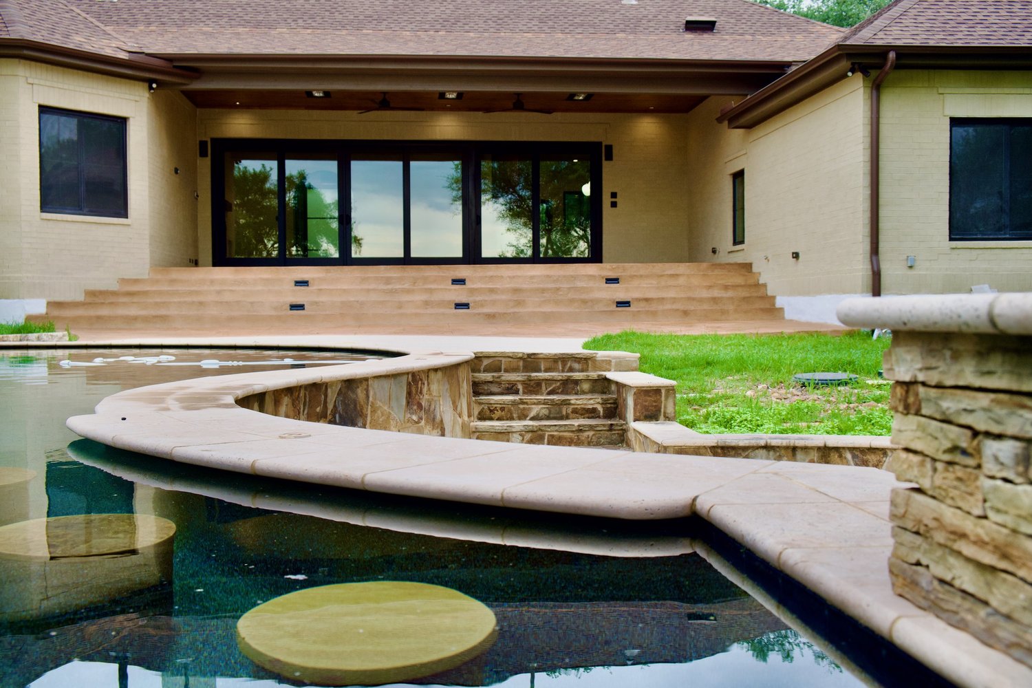 San Marcos project: covered patio and pool with outdoor living area