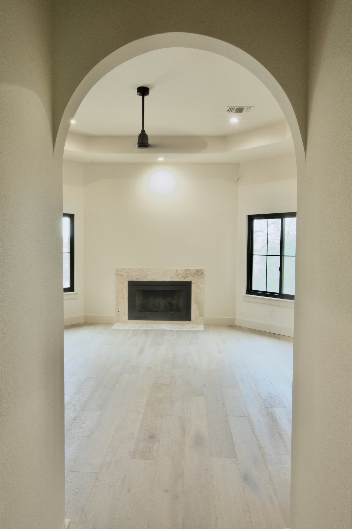 San Marcos project: primary bedroom with fireplace